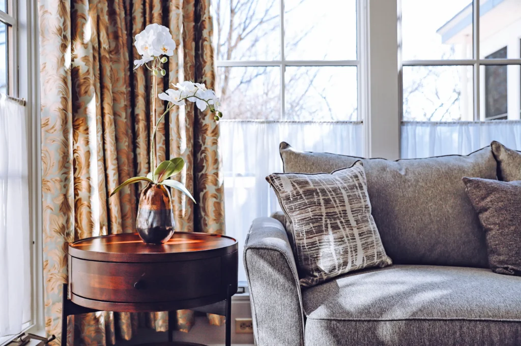 a living room with a couch and a table